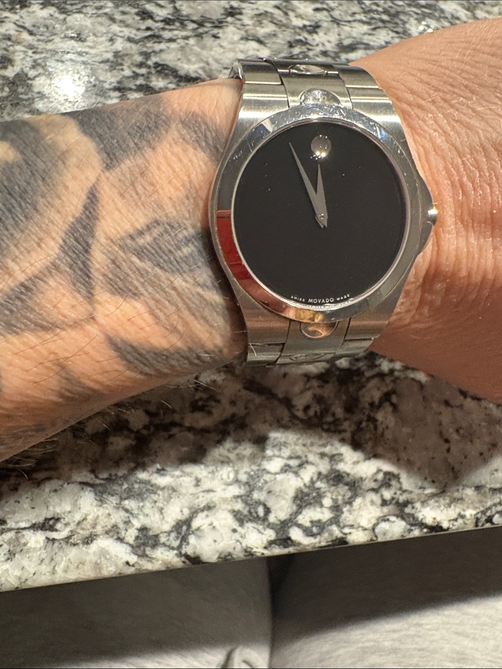 Movado Silver Stainless Steel Watch with Black Dial